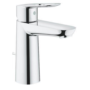 фотографія Смеситель однорычажный для раковины Grohe BauLoop M-Size 23762000 изготовлен из латуни. Глянцевая хромированная поверхность придает смесителю оригинальный вид. Интенсивность водяного потока и температура регулируются с помощью рычажного перемещения.-