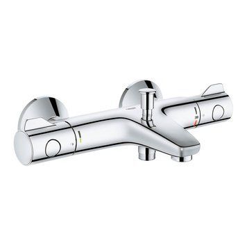 фотографія Термостатический смеситель для ванны Grohe Grohtherm 800 34567000 изготовлен из высококачественной латуни и имеет хромированную глянцевую поверхность. Для включения подачи воды и регулировки температуры смеситель оснащен двумя вентилями, делающими процесс